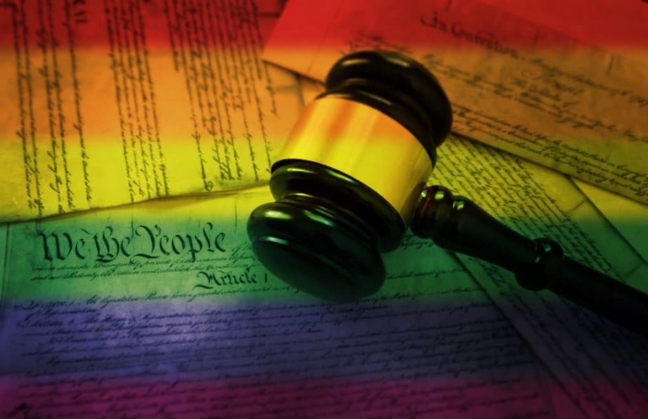 Court,Gavel,On,Rainbow,Flag,Colored,Pages,Of,The,United