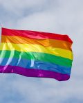 Rainbow,Flag,,A,Symbol,For,The,Lgbt,Community,,Waving,In